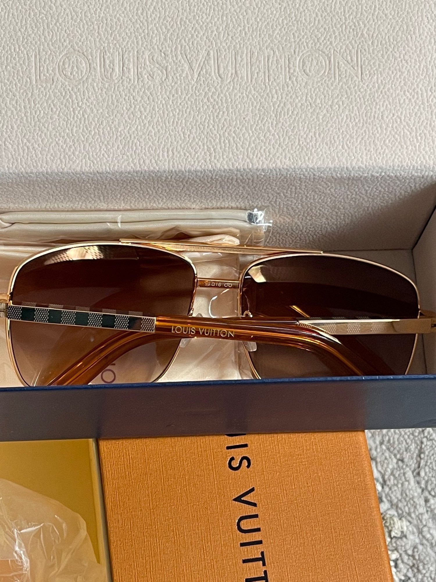 Louis Vuitton | Lv attitude sunglasses | Back View | yiodesigner.co.uk