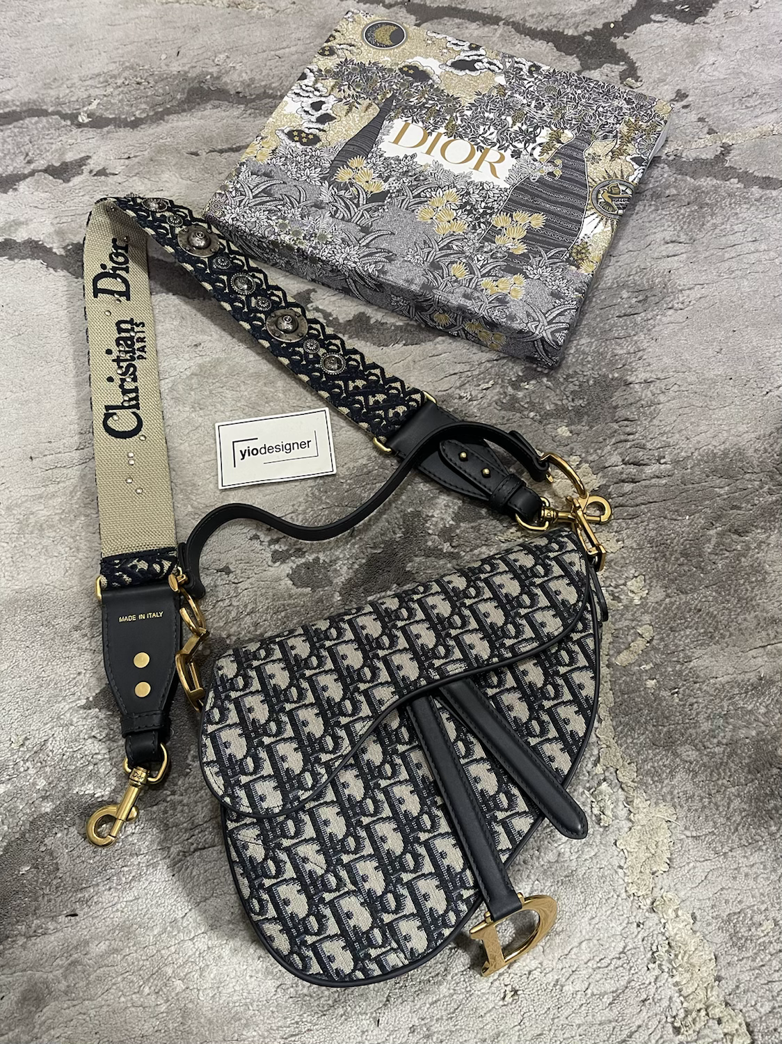 Dior | Womans saddle bag | Side View | yiodesigner.co.uk