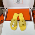 Hermes slider yellow