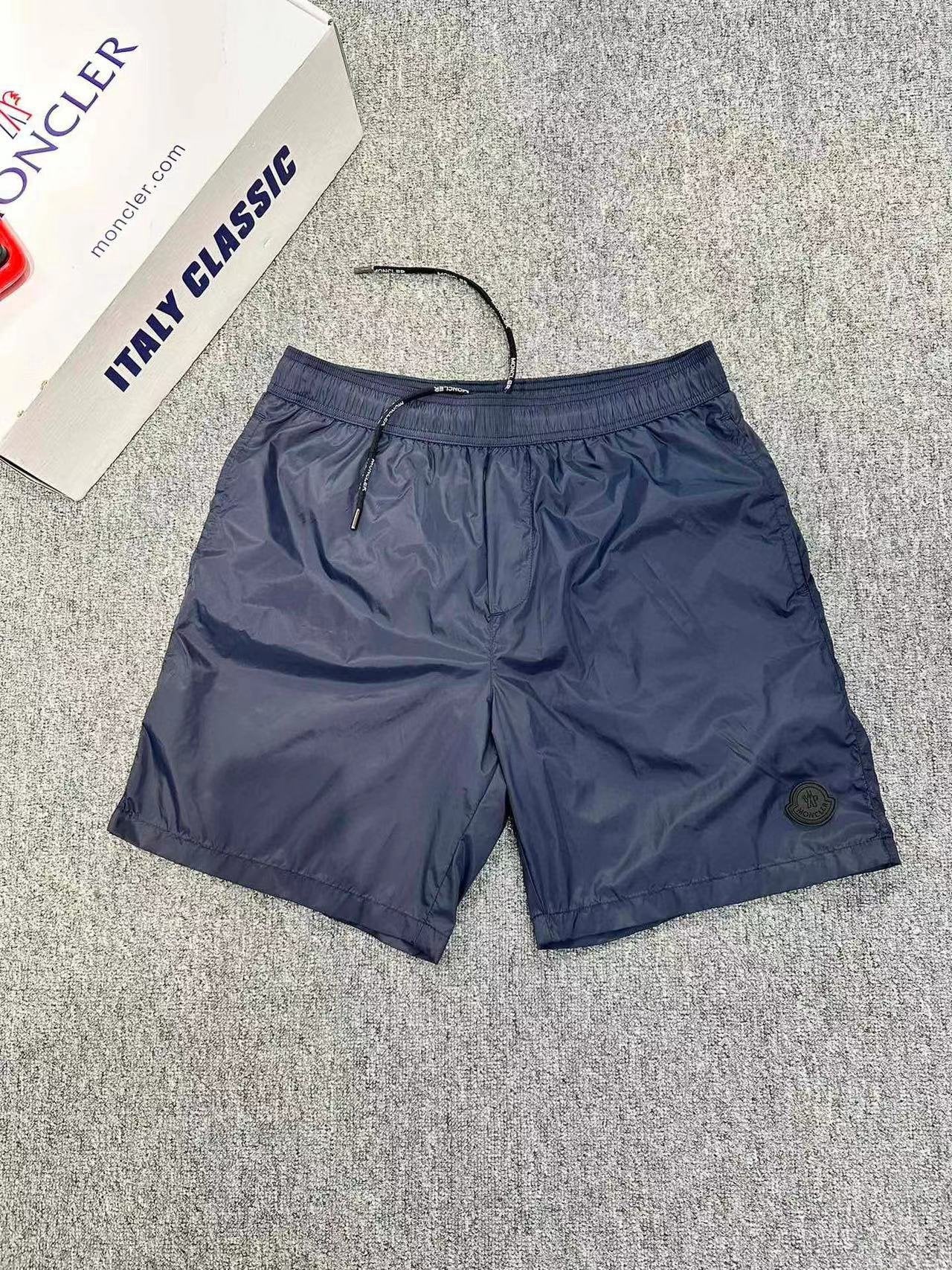 Moncler | Moncler short navy | Size XS | Front View | yiodesigner.co.uk