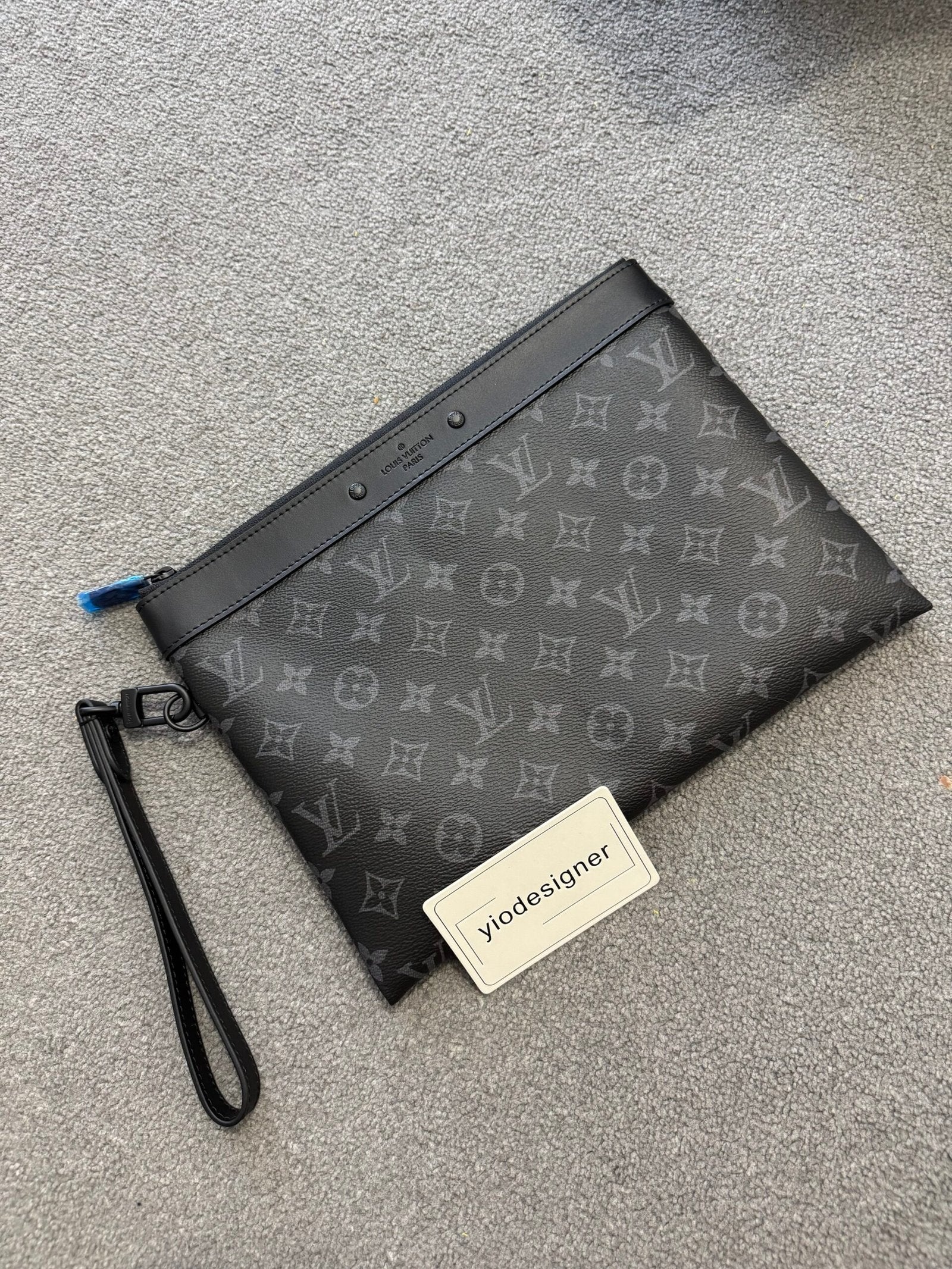 Louis Vuitton | Lv clutch bag | Back View | yiodesigner.co.uk