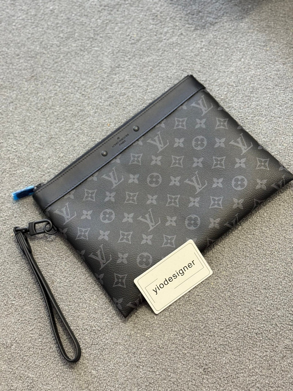 Louis Vuitton | Lv clutch bag | Front View | yiodesigner.co.uk