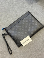 Louis Vuitton | Lv clutch bag | Front View | yiodesigner.co.uk