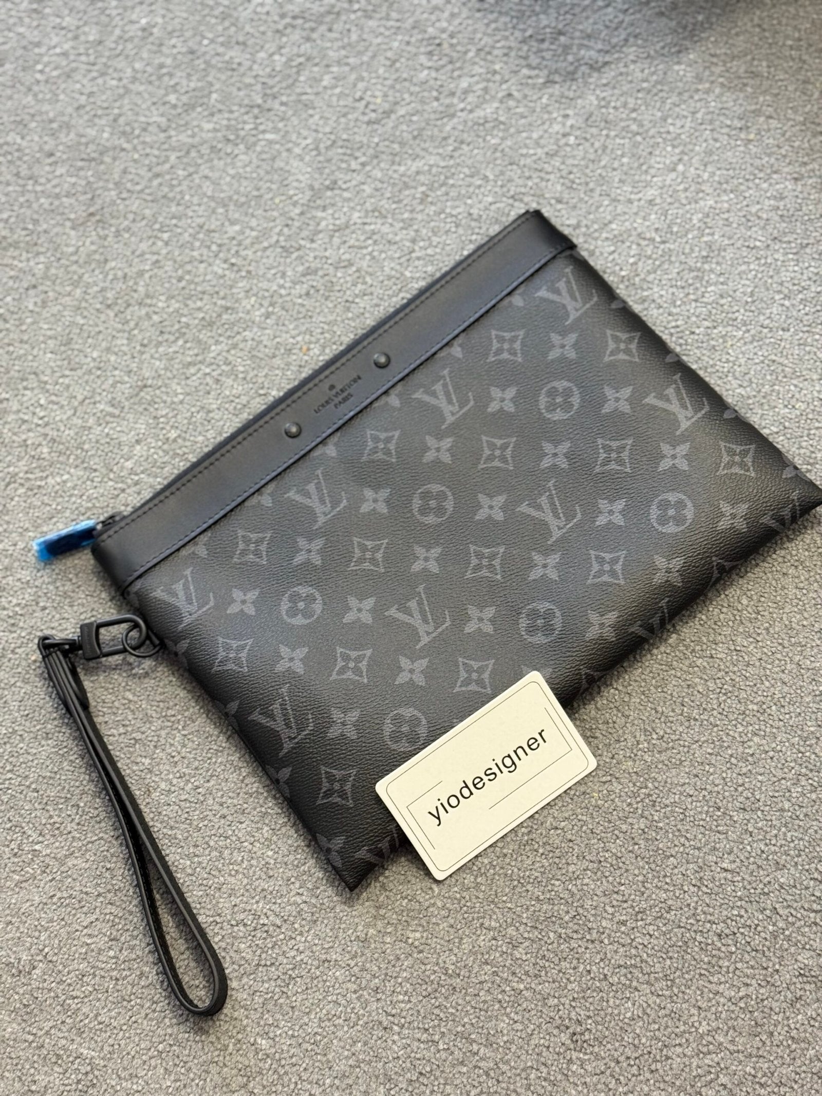 Louis Vuitton | Lv clutch bag | Front View | yiodesigner.co.uk
