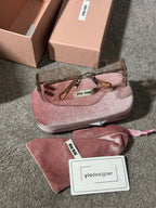 Miu Miu | Miu Miu sunglasses | Close-Up | yiodesigner.co.uk