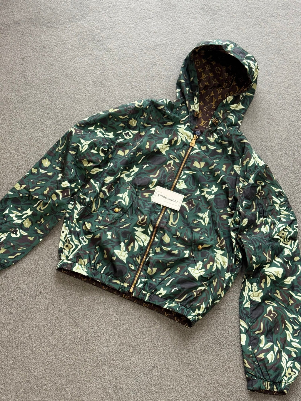 Louis Vuitton | Lv Reversible monogram windbreaker | Close-Up | yiodesigner.co.uk