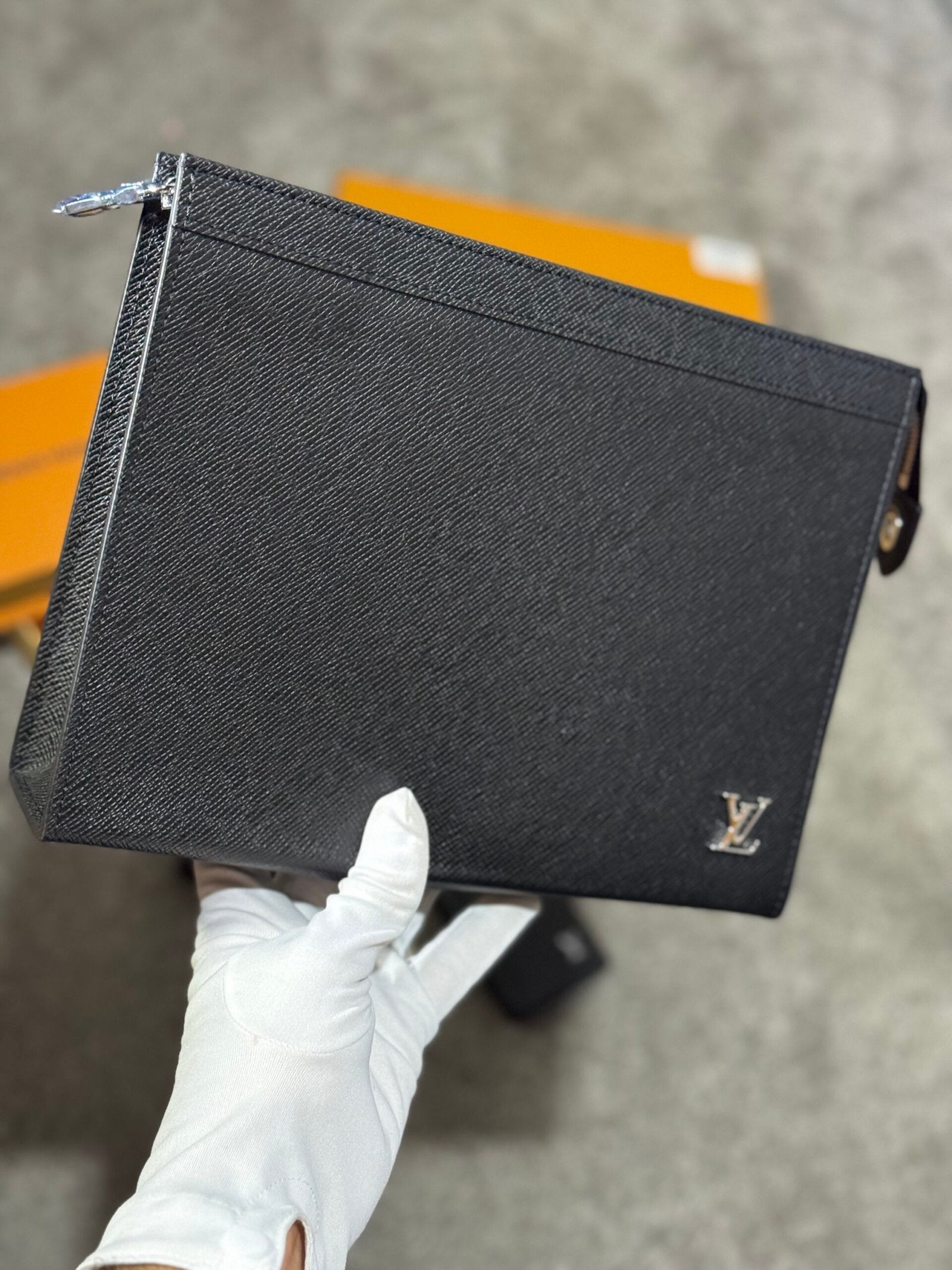 Louis Vuitton | Lv clutch bag | Front View | yiodesigner.co.uk